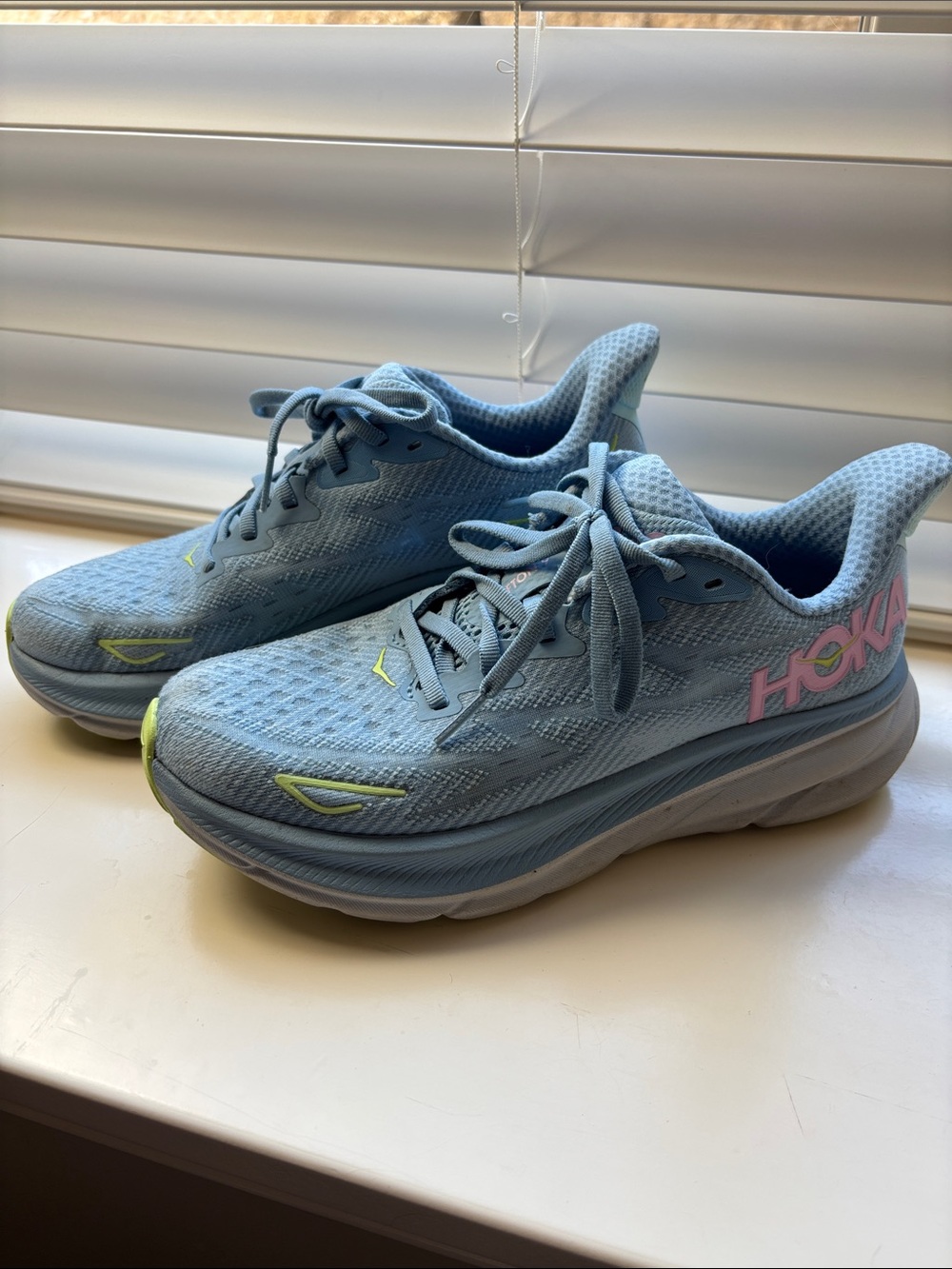 Hoka Blue Sneakers with Pink Logo and Green Accents